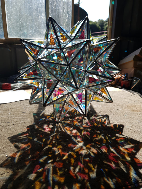 Unveiling the Sacred Geometry of the Stellated Truncated Icosahedron: A Masterpiece in Glass Art