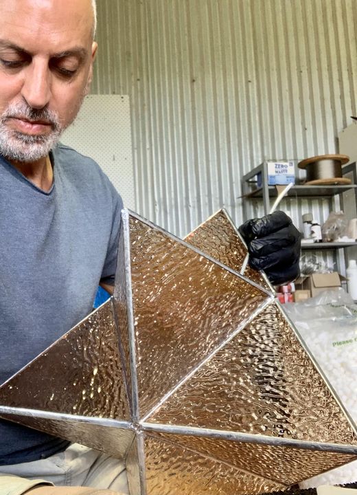 Crafting Brilliance:  Handcut Glass Merkaba